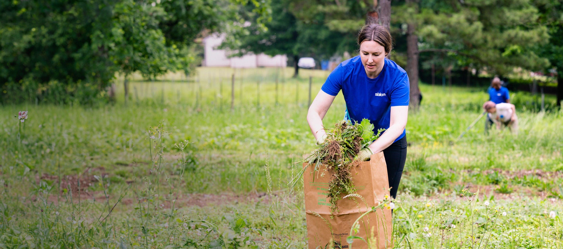 A Slalom employee volunteers to help clean up.