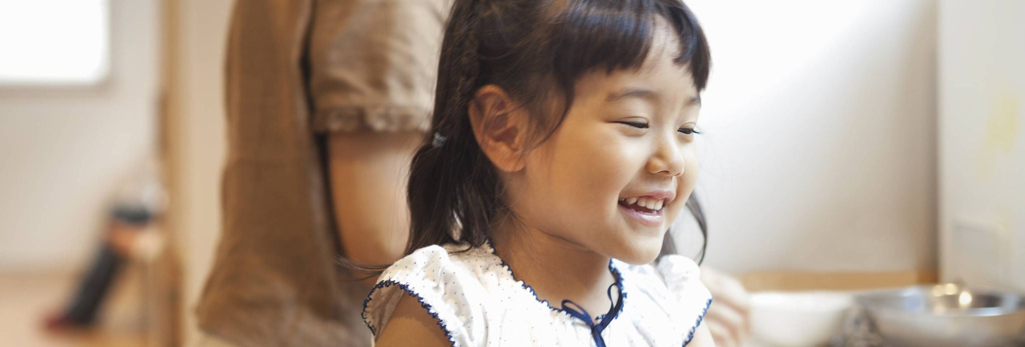 Close up photo of a smiling child.