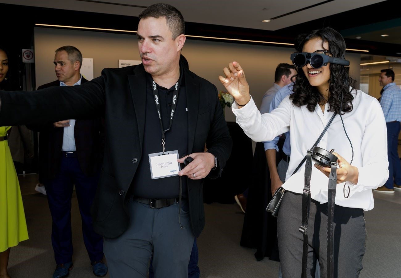 Woman wearing virtual reality headset at event