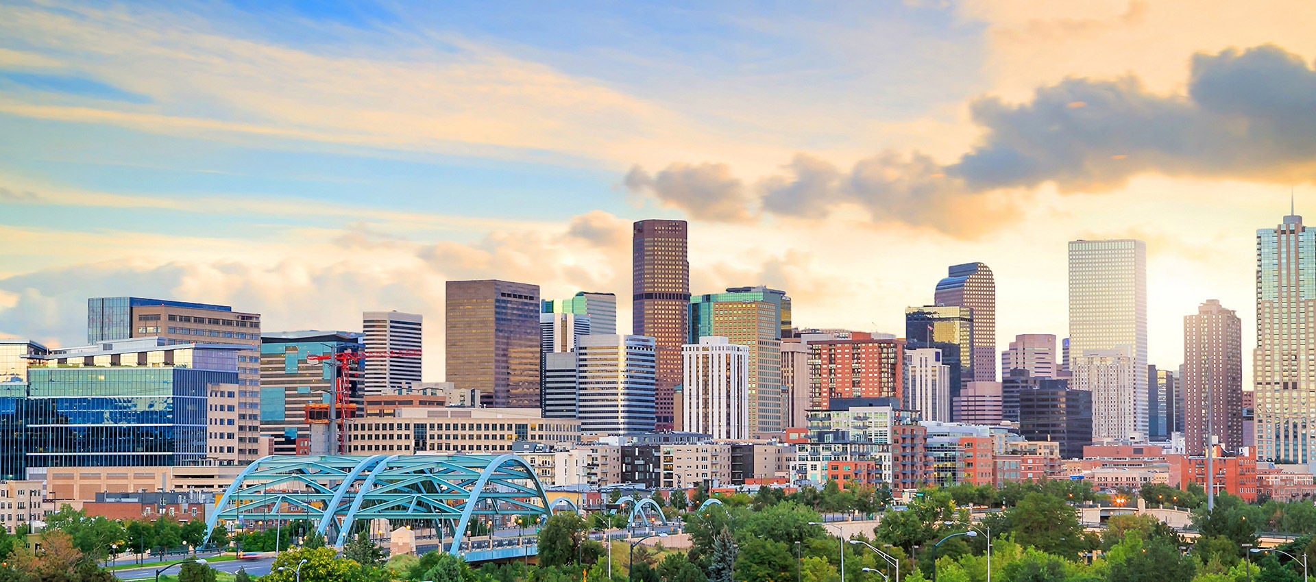 Panorama of Denver, Colorado skyline at twilight.
