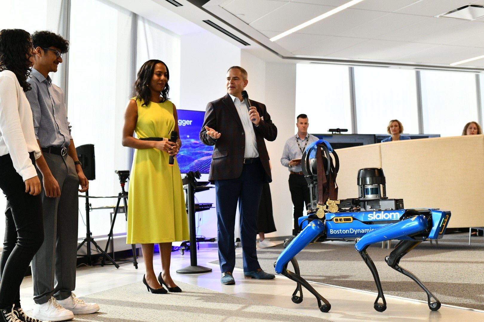 group interacting with robot dog