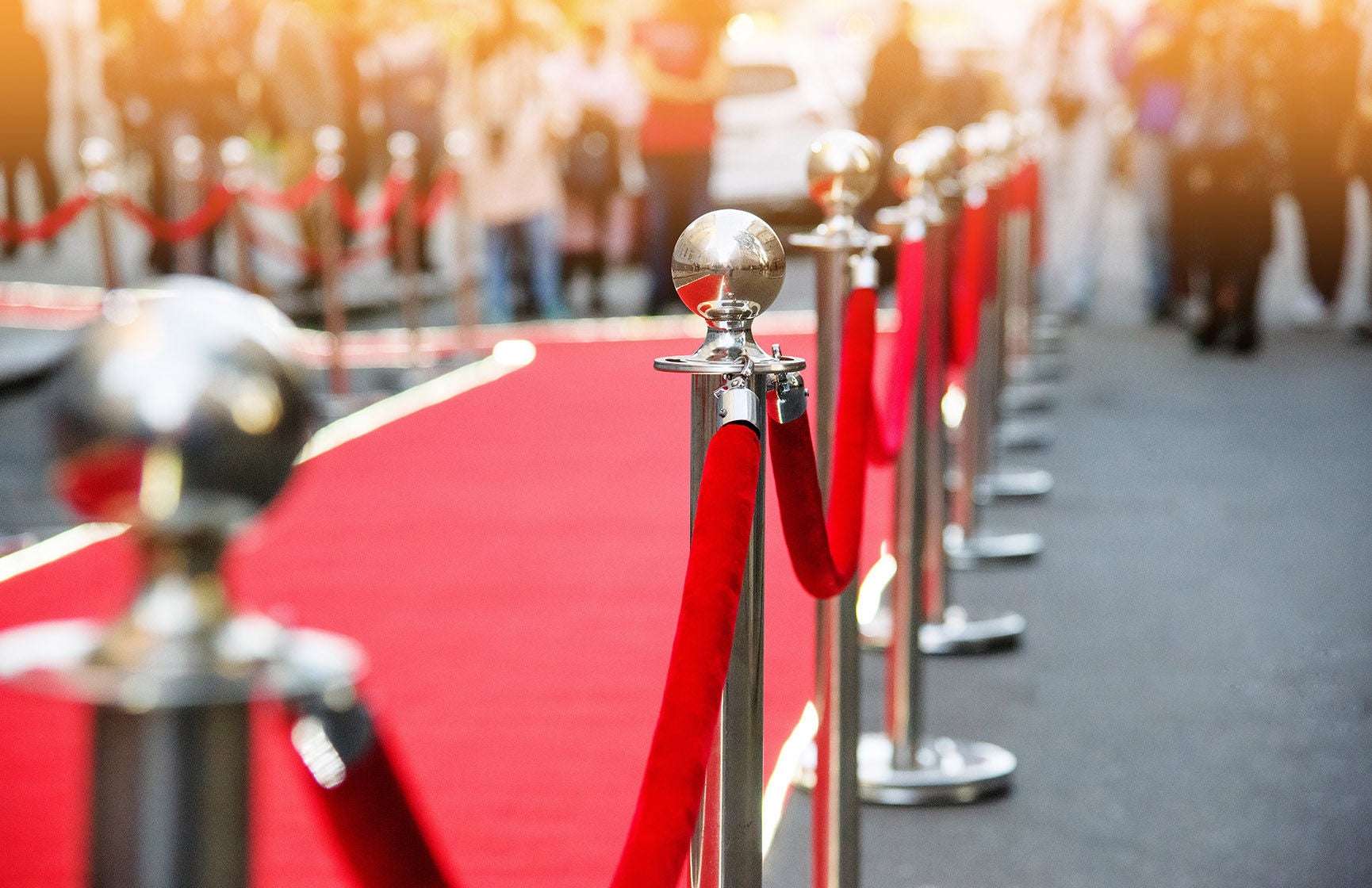 Red carpet and barrier on entrance before opening ceremony.