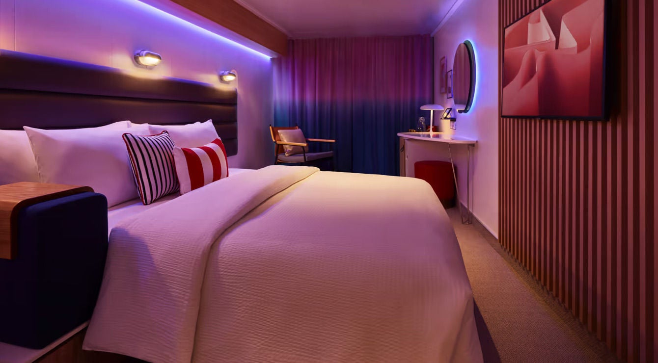 The inside of a cabin on a Virgin Voyages cruise ship.