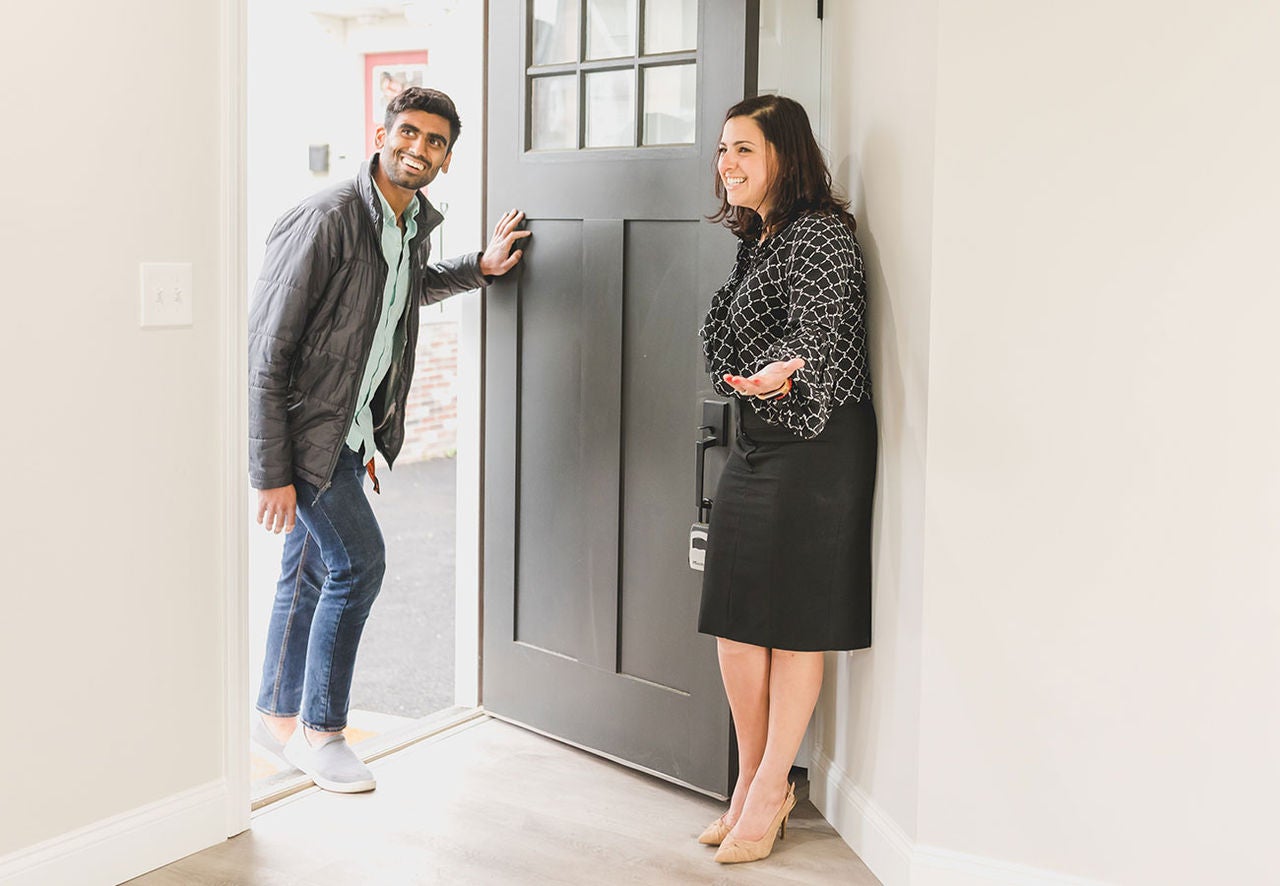 Man being shown a home by real estate agent.