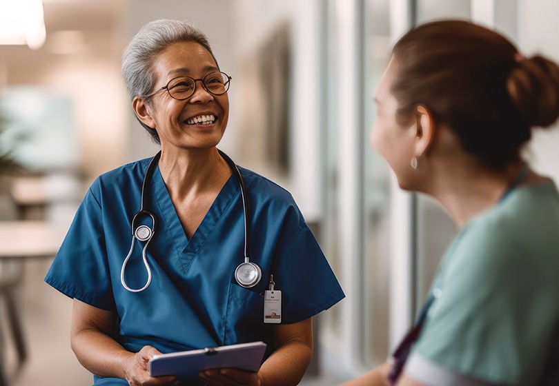 Candid shot of two nurses laughing and talking in a hospital, showcasing positivity, camaraderie among healthcare workers, generative ai, Candid shot of two nurses laughing and talking in a hospital, sh