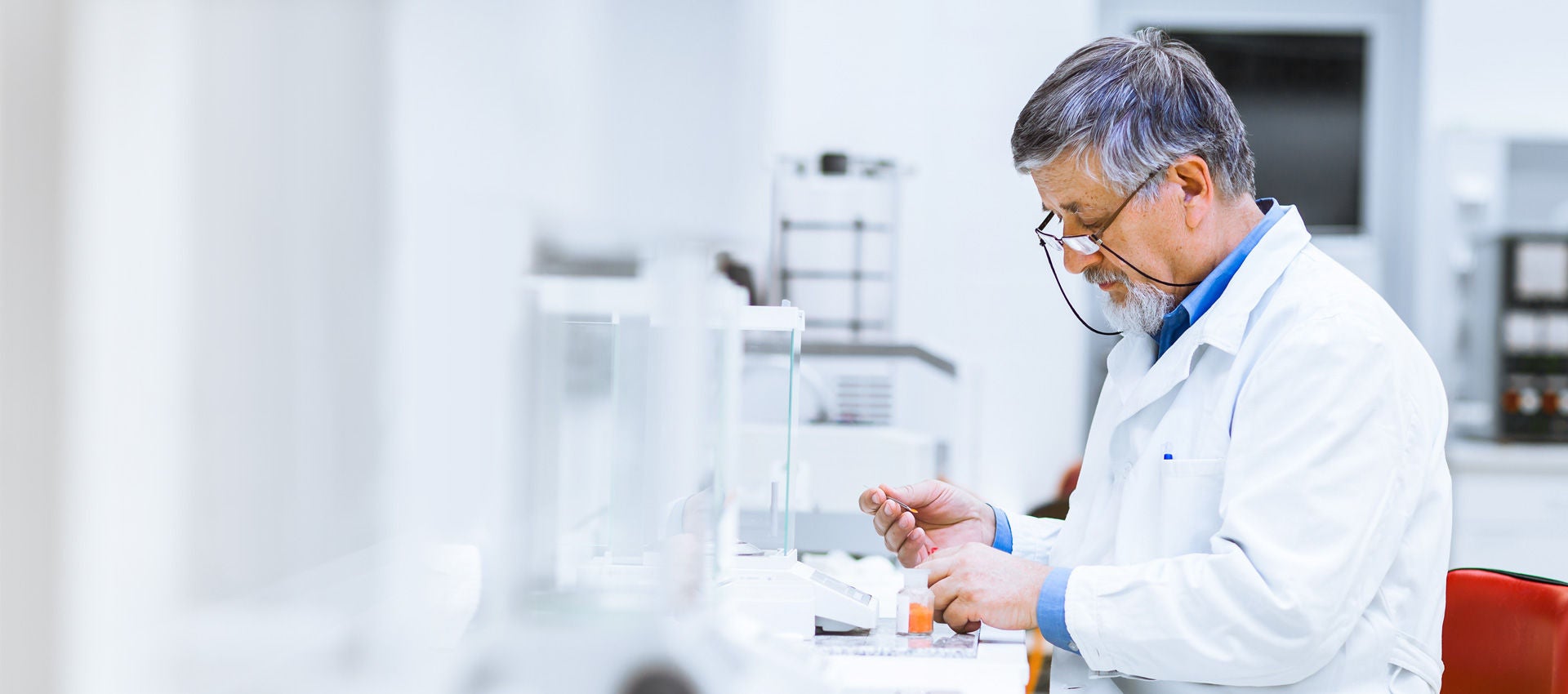 A scientist works on a biosciences project in a laboratory.