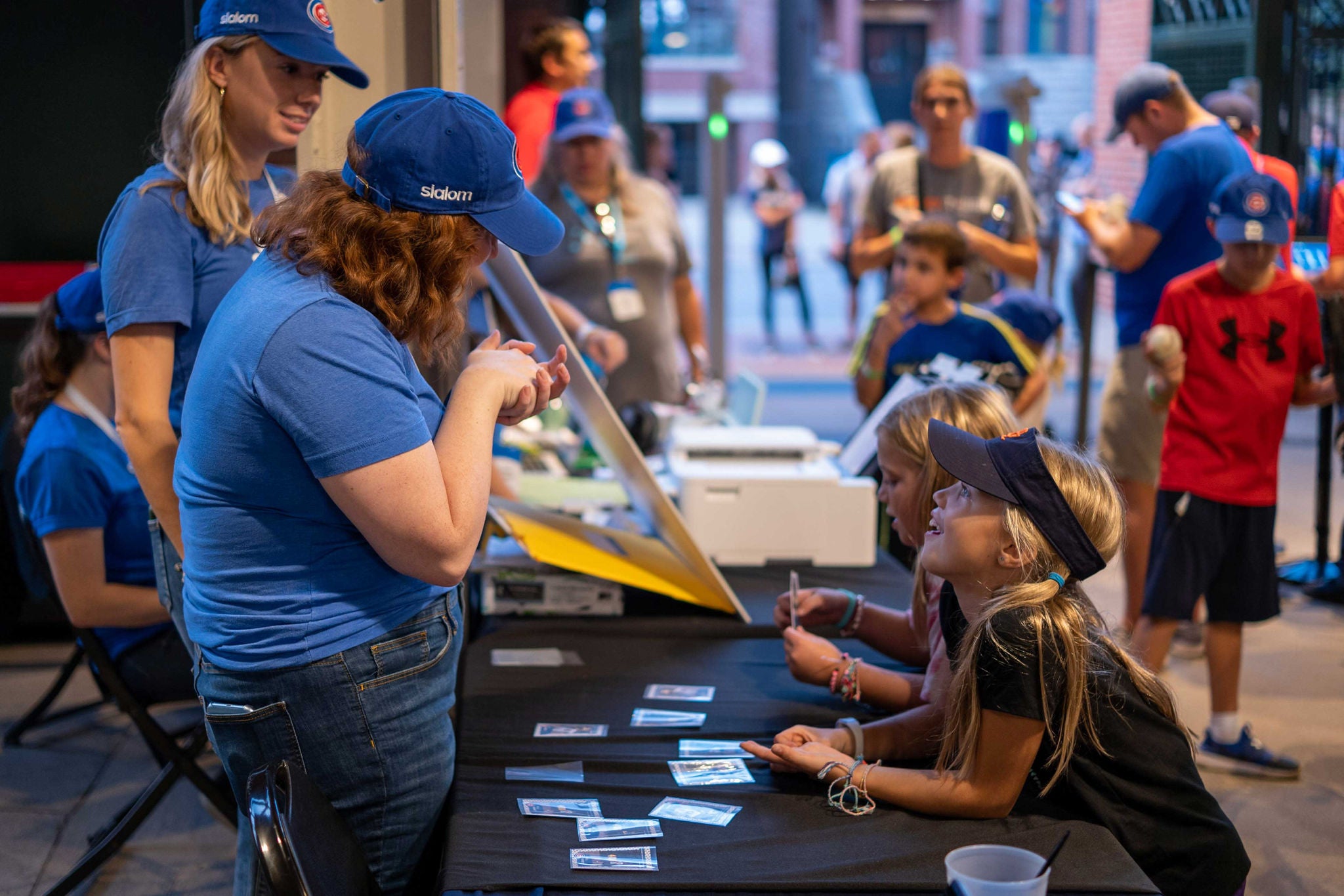 Kids meeting Slalom at an event for the annual Batting Practice at Wrigley Field.