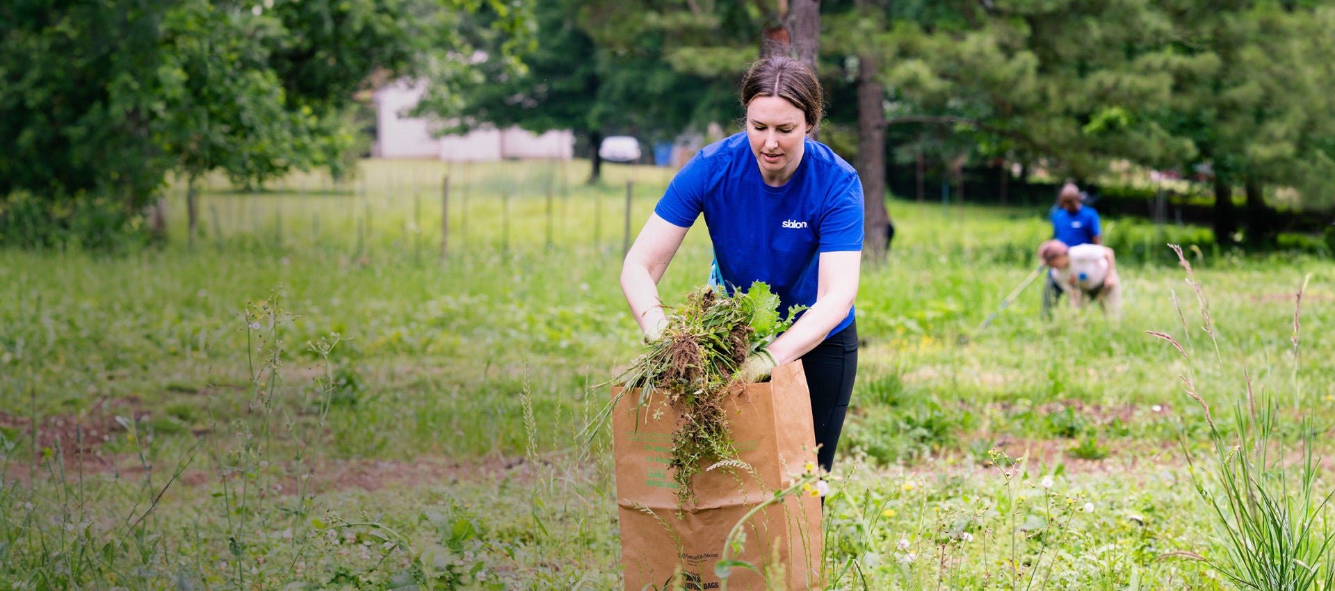 A Slalom employee volunteers to help clean up.