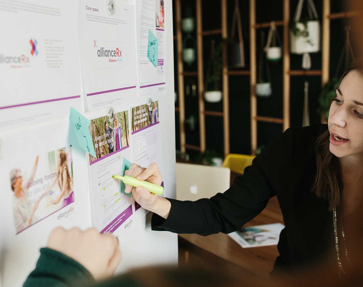 Woman planning and reviewing during a meeting