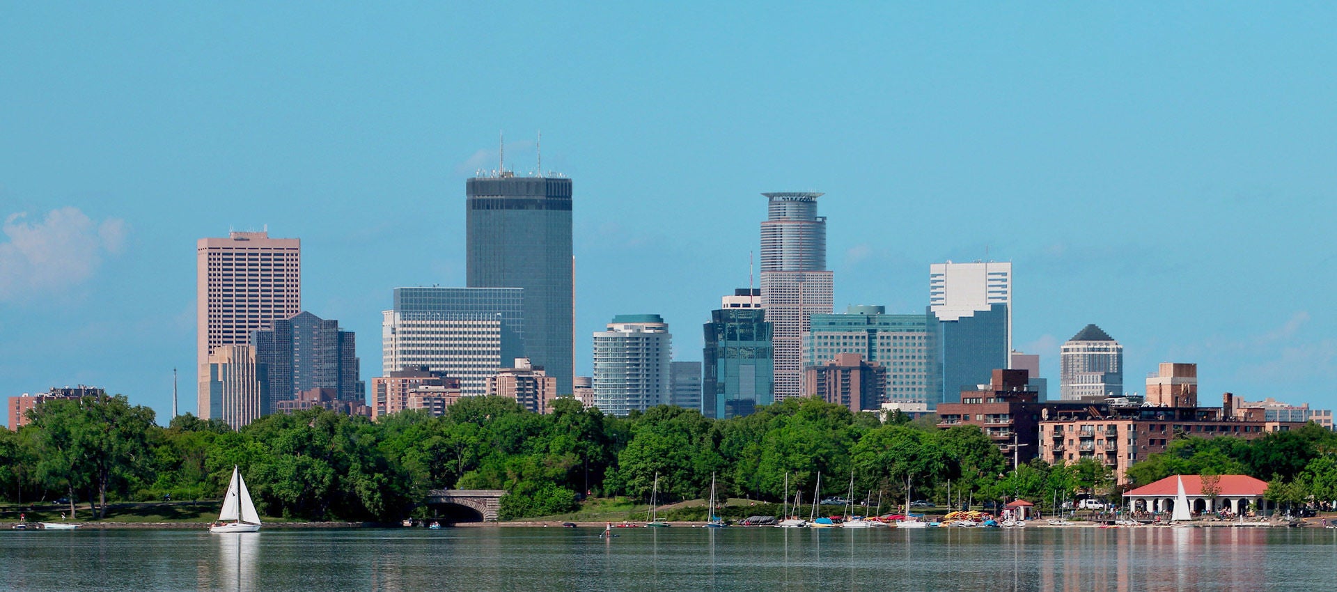 The Minneapolis skyline reflecting in Lake Calhoun on a warm summer day.
