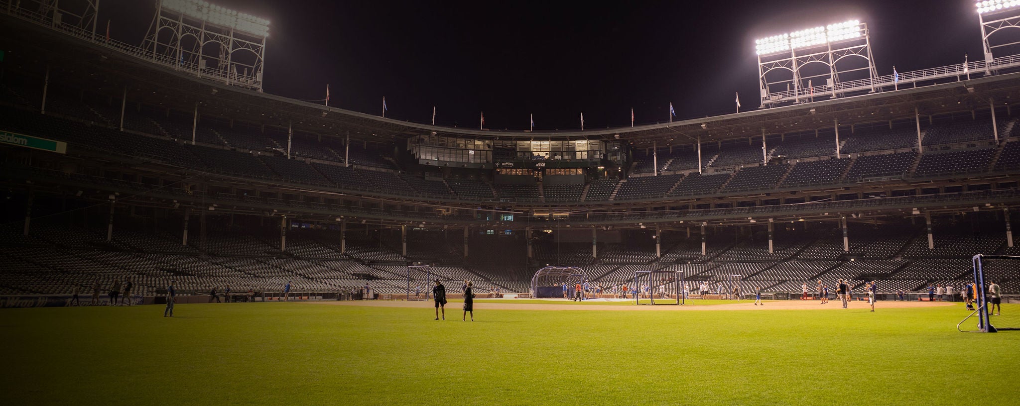 Chicago Cubs’ fans stand at the Wrigley stadium during the annual Batting Practice.